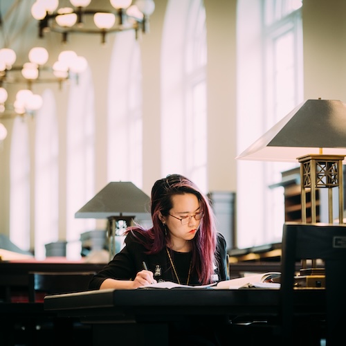 Student studying in Matheson Reading Room on the campus of Emory University