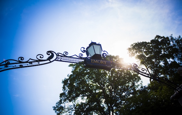 An archway with the Emory logo